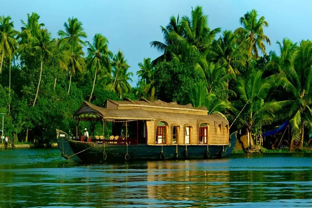 Kerala houseboat on palm-lined backwaters, cruise with Best Travel Agency in Kochi